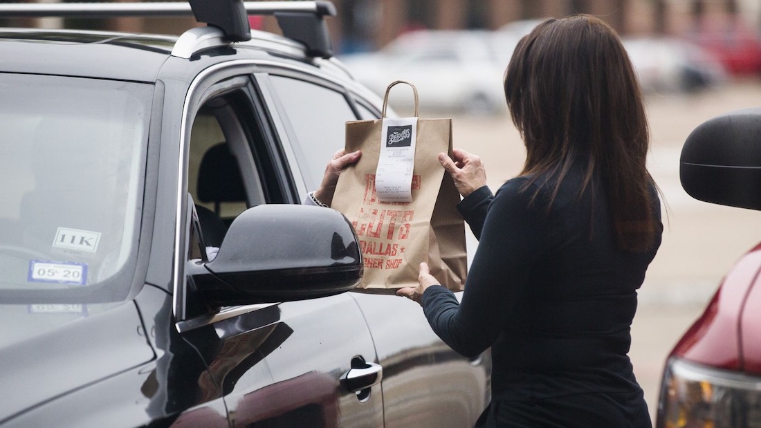 A photo showing curbside pickup in action  comparative market analysis real estate